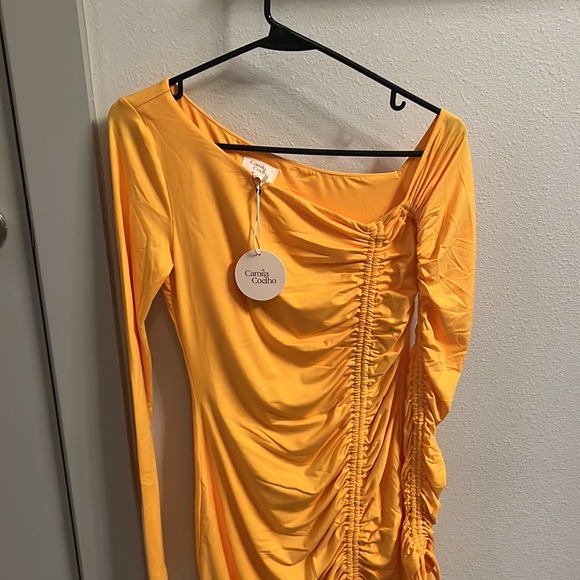 LENA MINI DRESS IN TANGERINE ORANGE
Camila Coelho
Color: Tangerine Orange - Picture 4 of 4